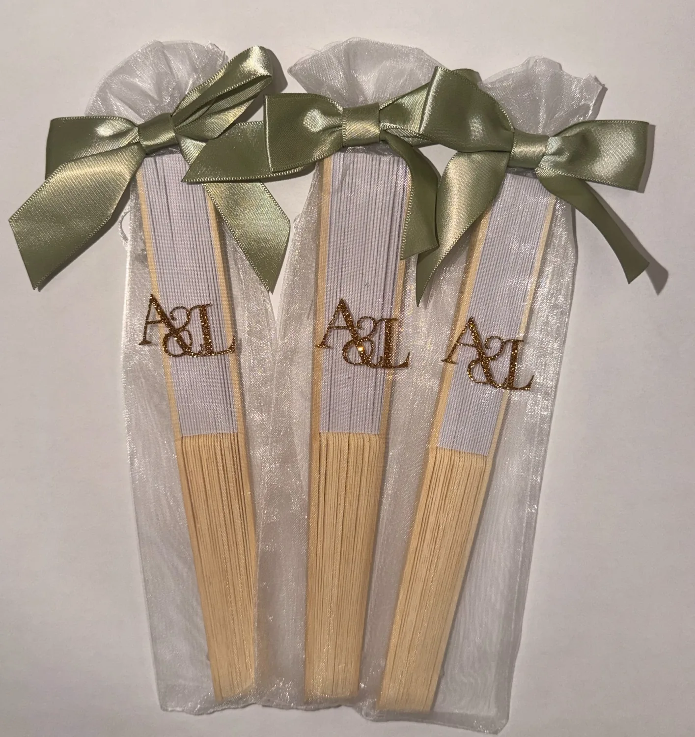 Monogrammed brushes with green bows